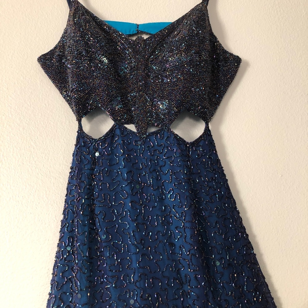 Luxury beaded dress with cut outs